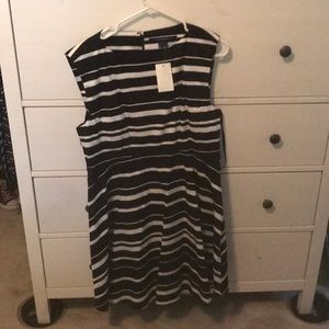 Never worn. Black and white striped dress.